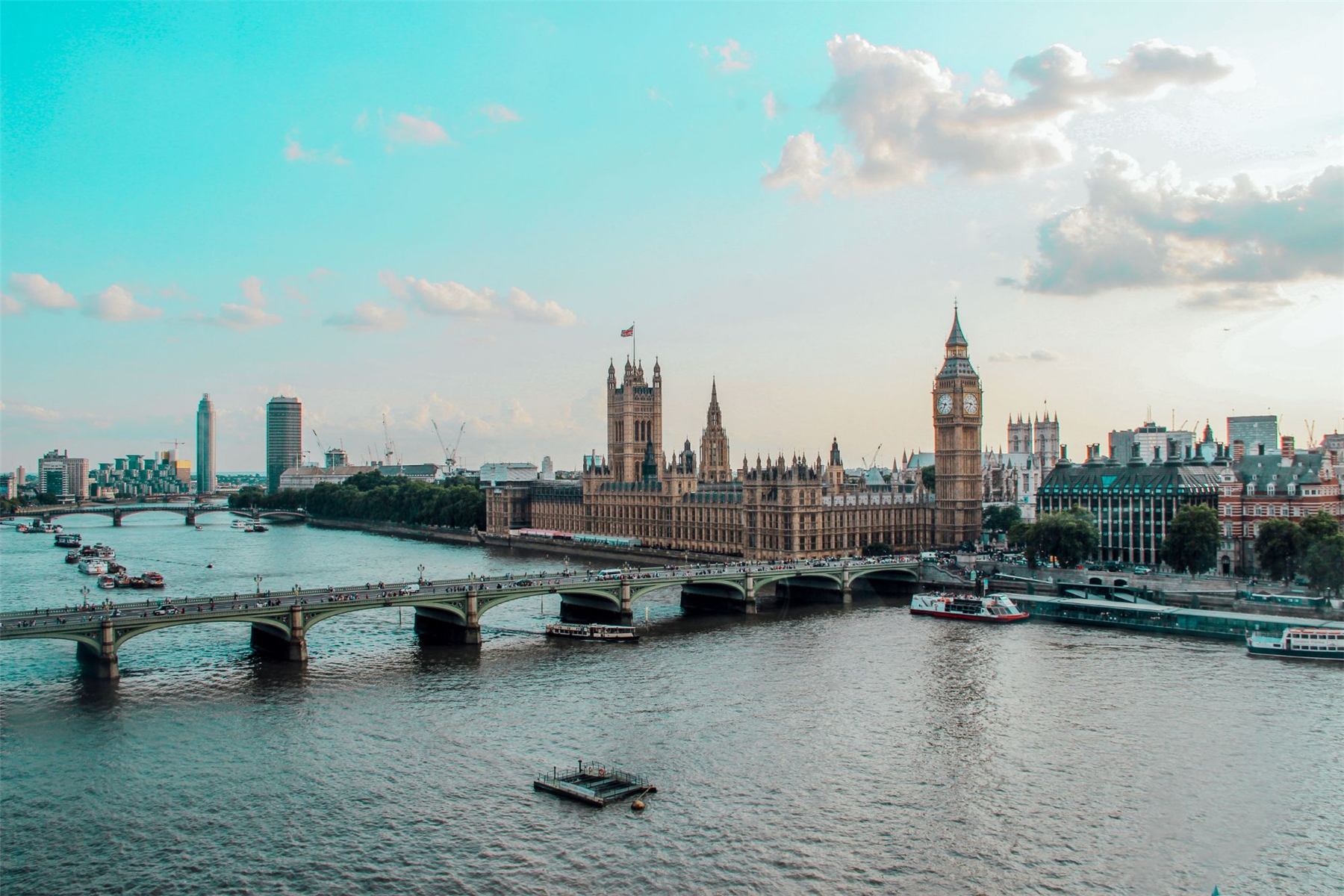 Big Ben and the Houses of Parliament beside Westminster Bridge on the River Thames